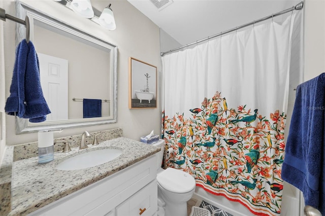 bathroom with shower / bath combo, visible vents, vanity, and toilet