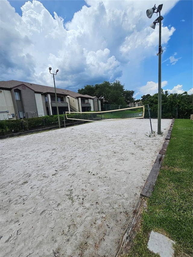 view of community featuring volleyball court