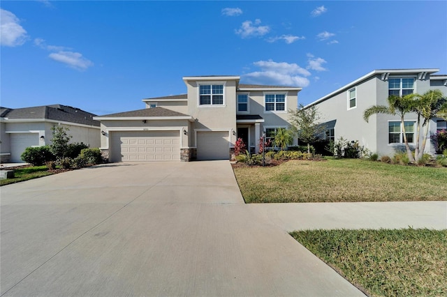 view of front of property featuring a garage and a front lawn