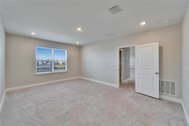 empty room with light carpet