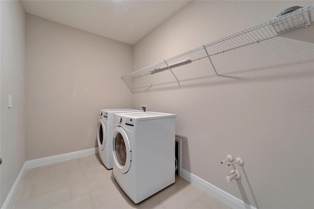 laundry area featuring washer and clothes dryer