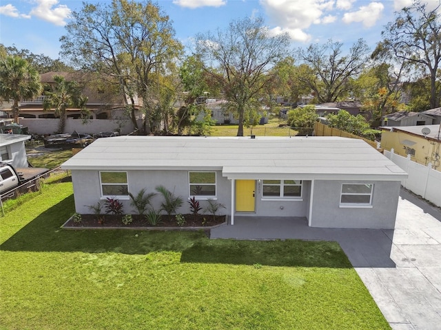 view of front of home with a front yard