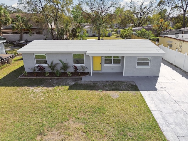 single story home featuring a patio and a front lawn