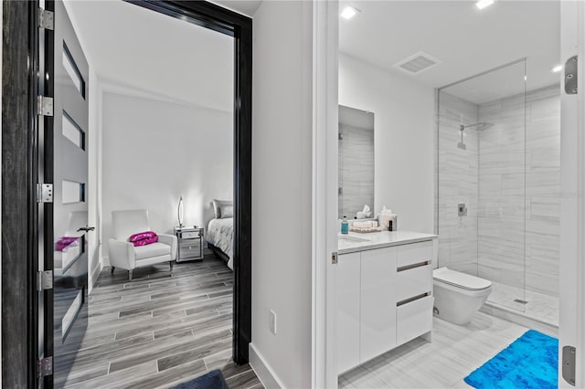 5120 Marina Way Unit 14002, Tampa, FL 33611 - full bath with a stall shower, visible vents, toilet, ensuite bath, and vanity