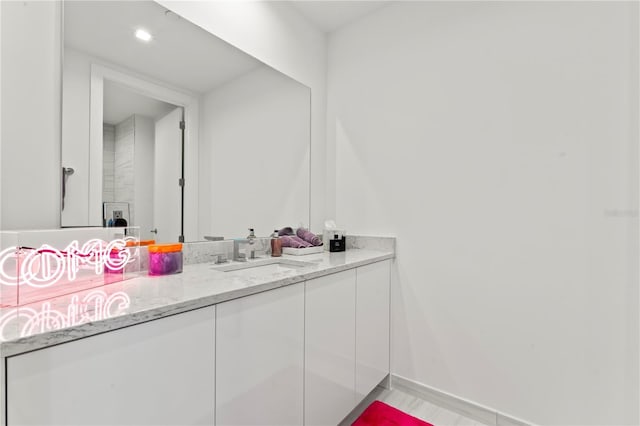 5120 Marina Way Unit 14002, Tampa, FL 33611 - bathroom with vanity and baseboards