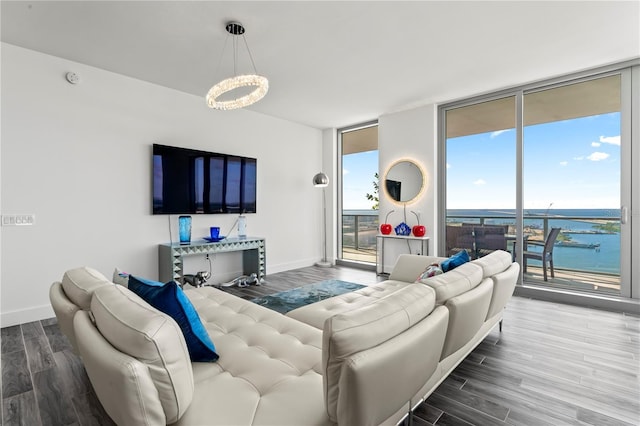 5120 Marina Way Unit 14002, Tampa, FL 33611 - living room with floor to ceiling windows, baseboards, and wood finished floors