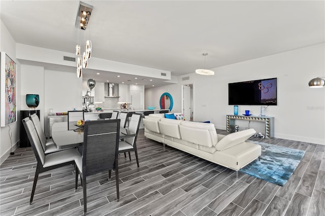 5120 Marina Way Unit 14002, Tampa, FL 33611 - dining space with wood tiled floor, visible vents, and baseboards
