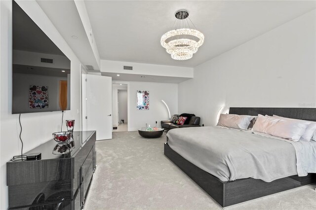 5120 Marina Way Unit 14002, Tampa, FL 33611 - bedroom with light carpet, visible vents, and a chandelier