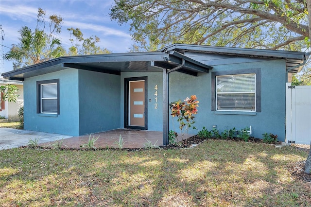 view of front of home with a front yard