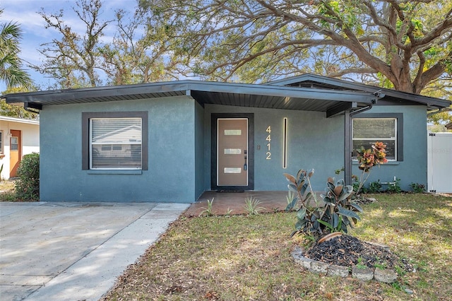 view of front of property featuring stucco siding