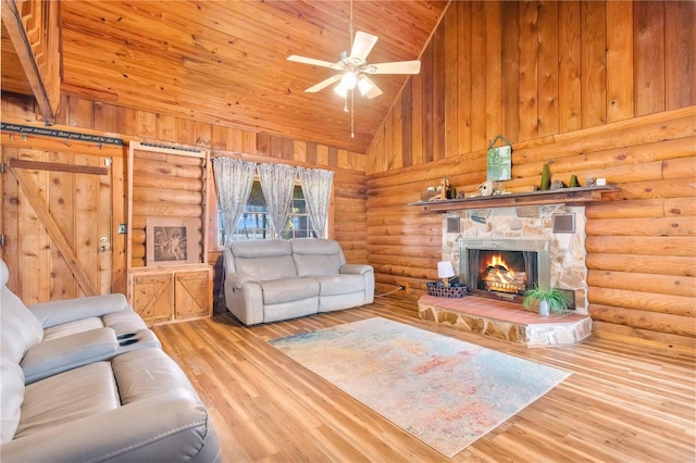 living room with a stone fireplace, high vaulted ceiling, rustic walls, hardwood / wood-style flooring, and wood ceiling