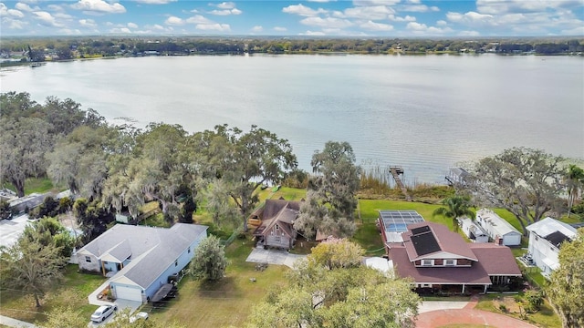 bird's eye view with a water view