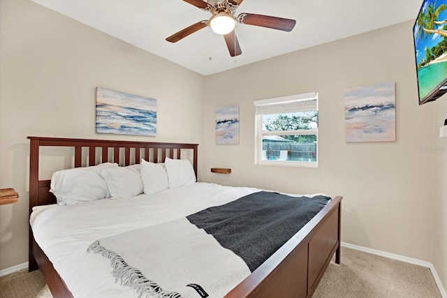 bedroom with light carpet and ceiling fan