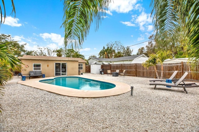 view of pool featuring a patio