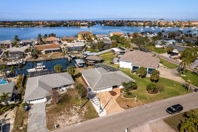 drone / aerial view with a water view