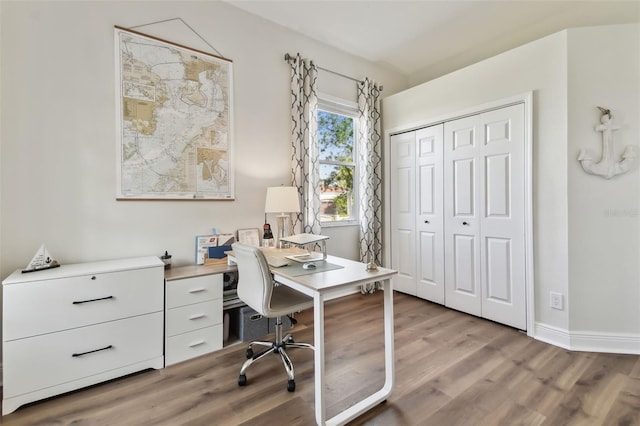 office space featuring light wood-type flooring