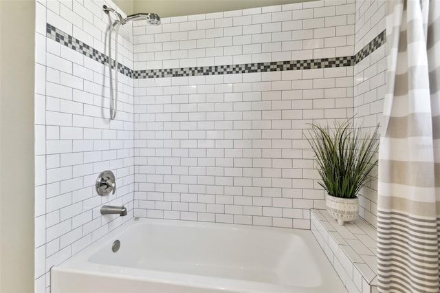 bathroom with shower / bath combo