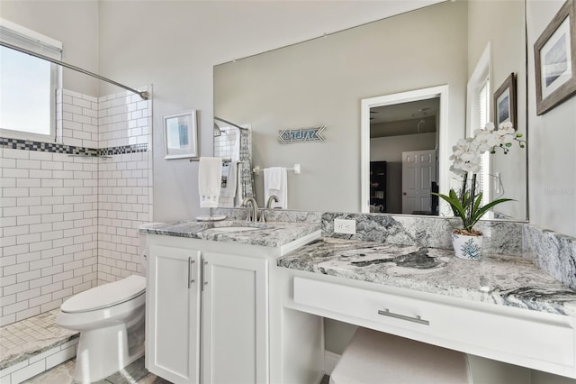 bathroom with vanity, toilet, and a shower with curtain