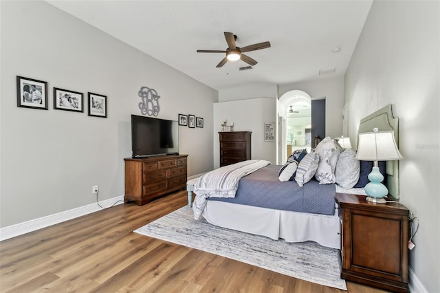 bedroom featuring hardwood / wood-style floors and ceiling fan