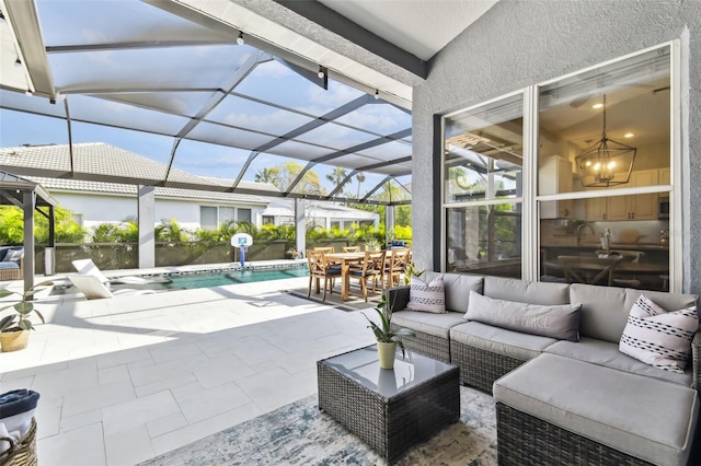 view of patio / terrace featuring a lanai and an outdoor hangout area