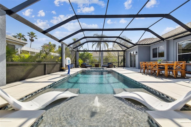 view of swimming pool featuring a patio and glass enclosure