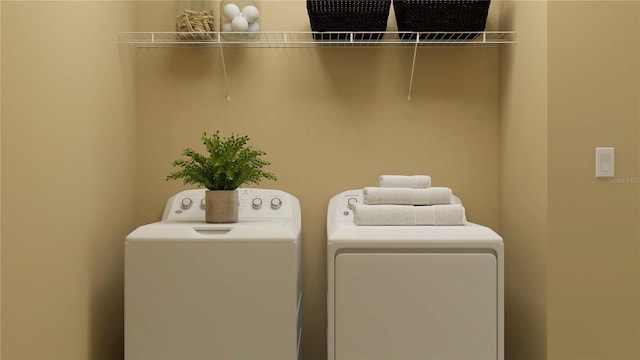 washroom featuring independent washer and dryer