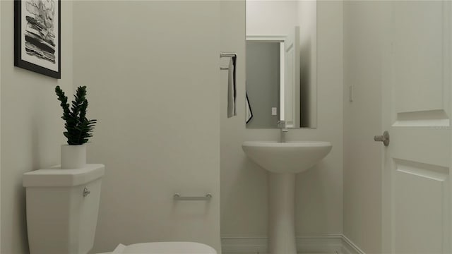 bathroom featuring toilet