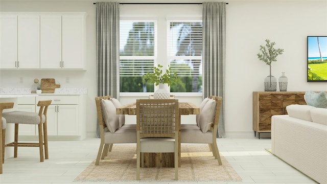 dining area featuring light wood-type flooring