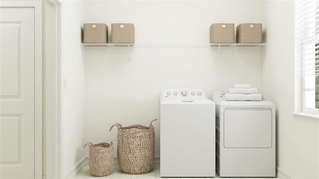 laundry room with washing machine and dryer