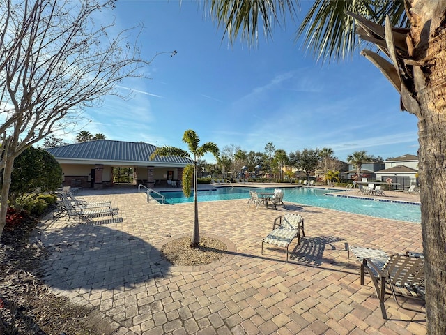 4734 Chatterton Way, Riverview, FL 33578 - community pool featuring a patio area