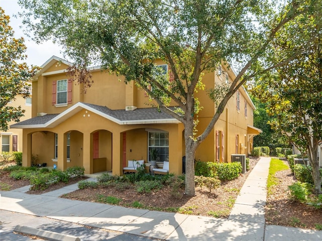 4734 Chatterton Way, Riverview, FL 33578 - view of property with a porch, central AC unit, stucco siding, and a shingled roof