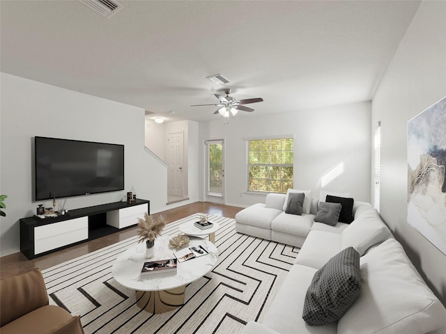 4734 Chatterton Way, Riverview, FL 33578 - living area with a ceiling fan and baseboards