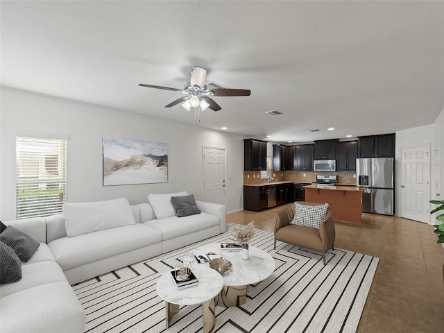 4734 Chatterton Way, Riverview, FL 33578 - living area featuring ceiling fan, recessed lighting, and light tile patterned floors