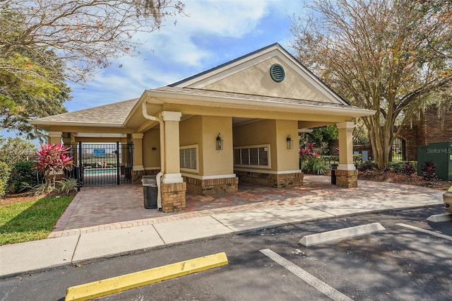 view of front of home featuring a carport