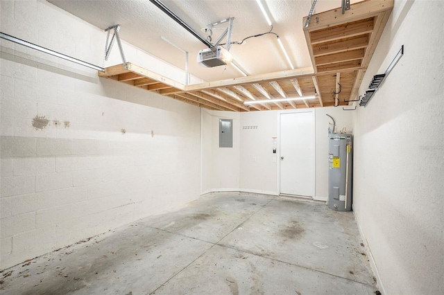 garage featuring a garage door opener, electric panel, and water heater