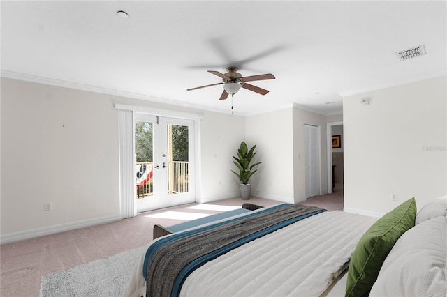 carpeted bedroom with access to exterior, crown molding, french doors, and ceiling fan