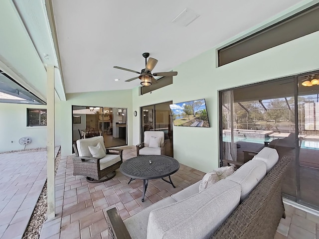 view of patio with an outdoor living space and ceiling fan