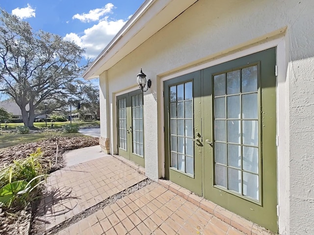 exterior space with french doors and a patio