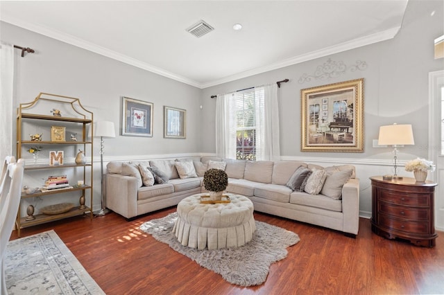 living room featuring ornamental molding and dark hardwood / wood-style floors