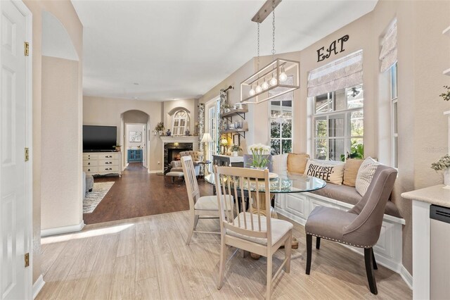 dining space with light wood-type flooring