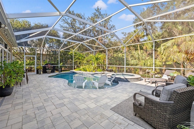 view of swimming pool with an in ground hot tub, glass enclosure, and a patio