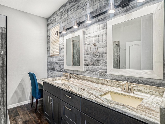 bathroom with vanity and hardwood / wood-style floors