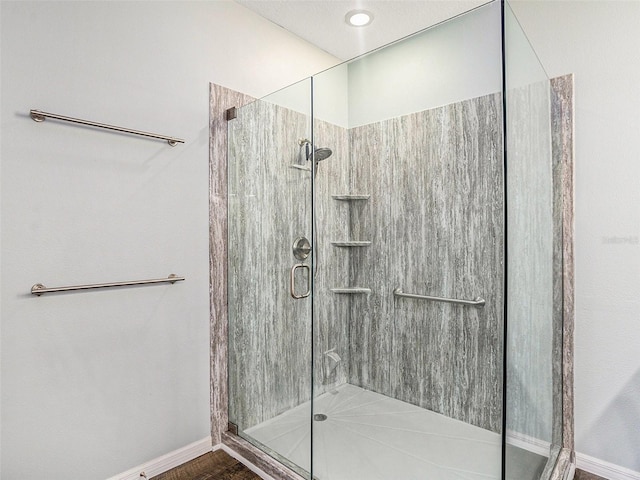 bathroom featuring an enclosed shower