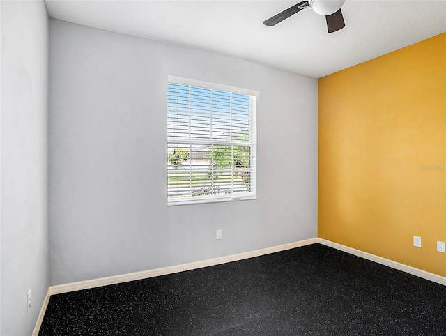 empty room featuring ceiling fan