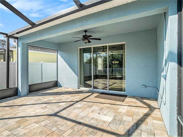 view of patio with ceiling fan