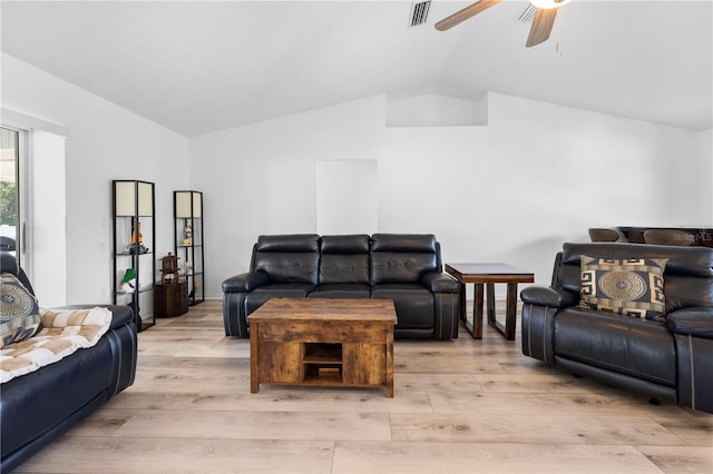 living room with ceiling fan, lofted ceiling, and light hardwood / wood-style floors