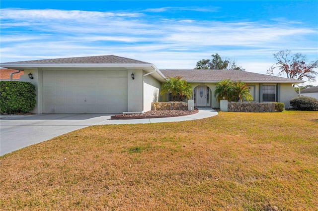 ranch-style home with a garage and a front yard