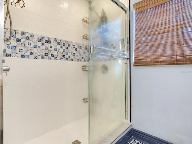 bathroom with an enclosed shower