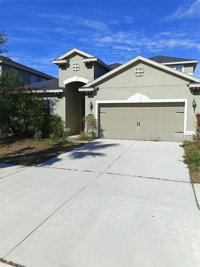 view of front of home featuring a garage