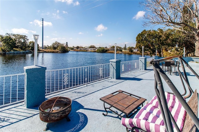 view of patio / terrace with a water view